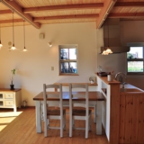 サンプラス でこぼこ塗り壁とパインの家。施工例